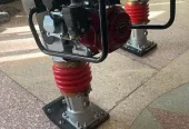 Jumping jack compactor